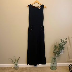 Wide legged black jumpsuit with cute buttons!